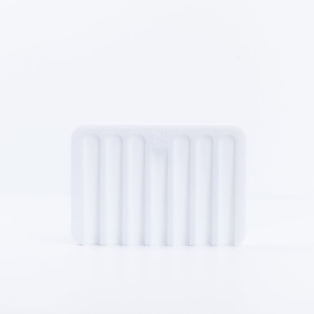 One White Silicone Soap Dish placed on its side