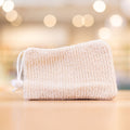 Tan Fabric Soap Sleeve on counter